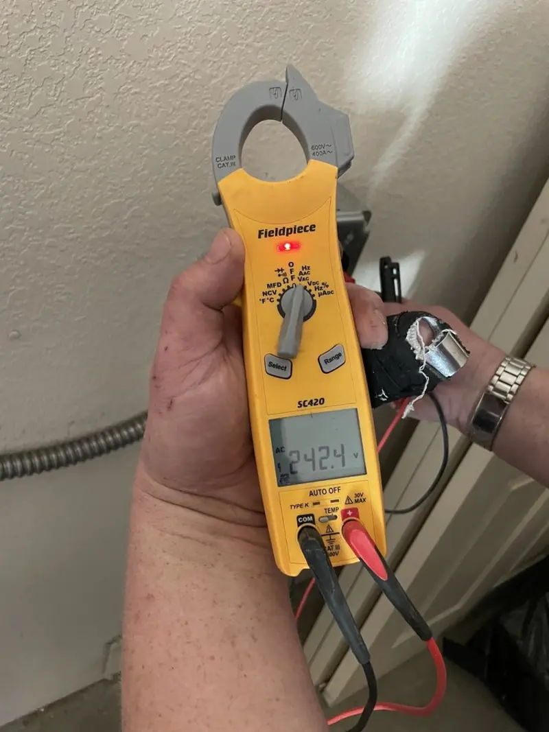 Voltage testing with clamp meter during Circuit Breaker Repair in Kenton